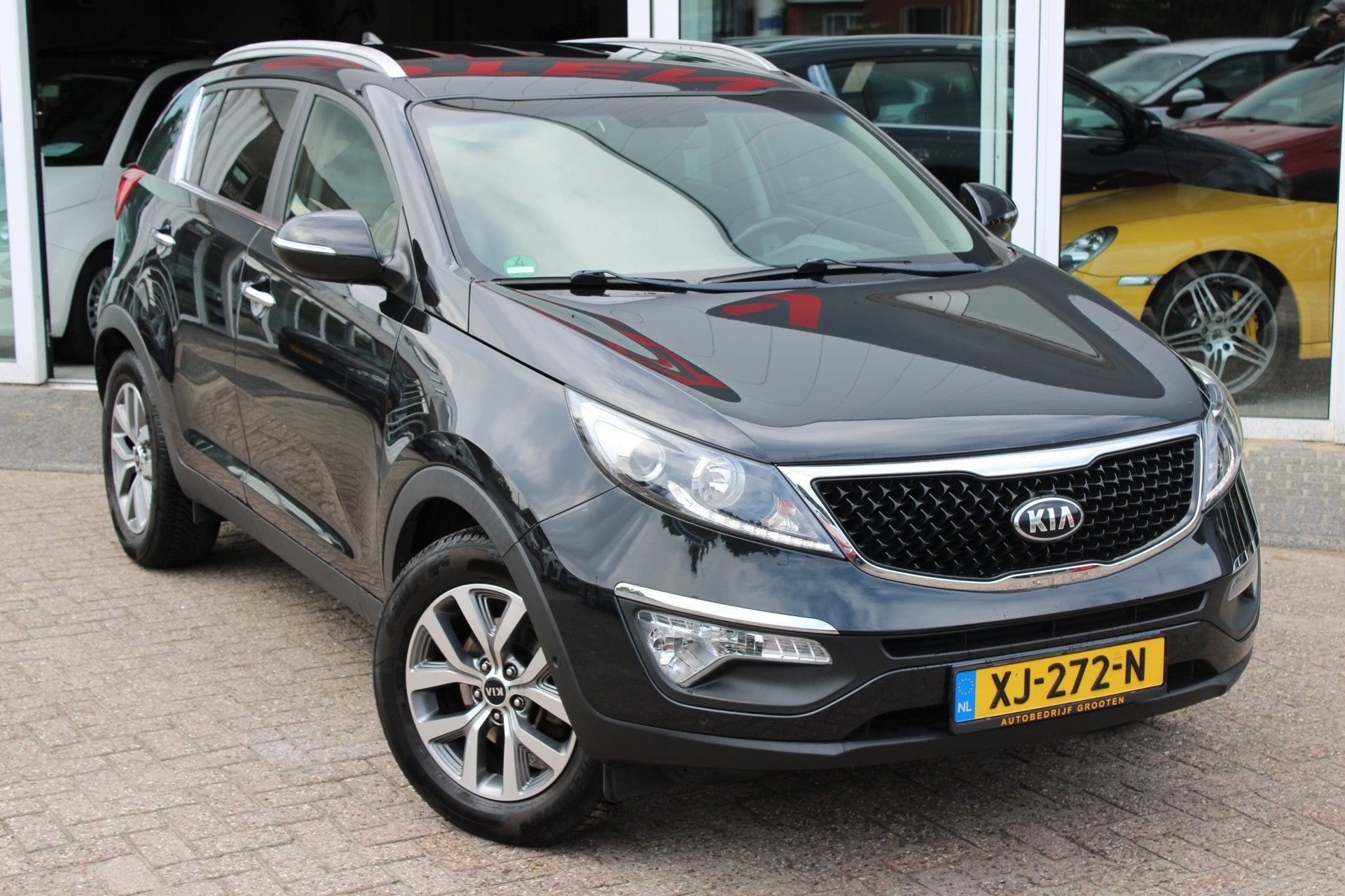 Kia Sportage 1.6 GDI DynamicPlusLine (bj 2015), Auto's, Voorwielaandrijving, 4 cilinders, Zwart, SUV of Terreinwagen