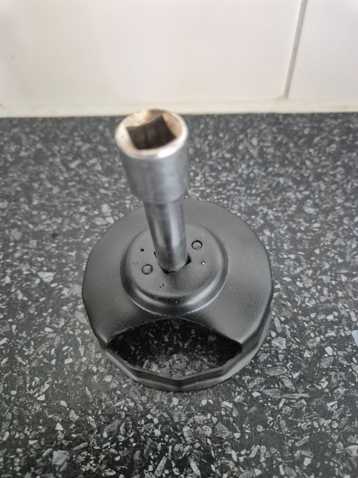 Oliefilter sleutel, Ophalen