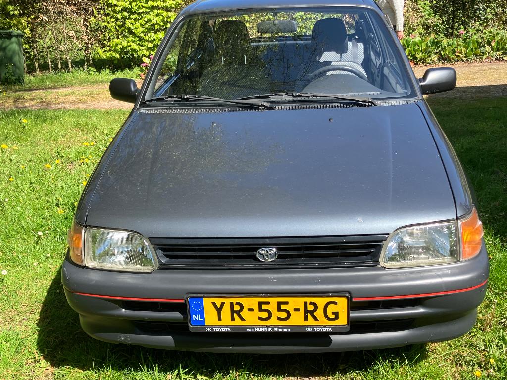 Toyota Starlet 1.3 XL AUT 1990 Grijs, Auto's, Stof, 74 pk, Starlet, Origineel Nederlands