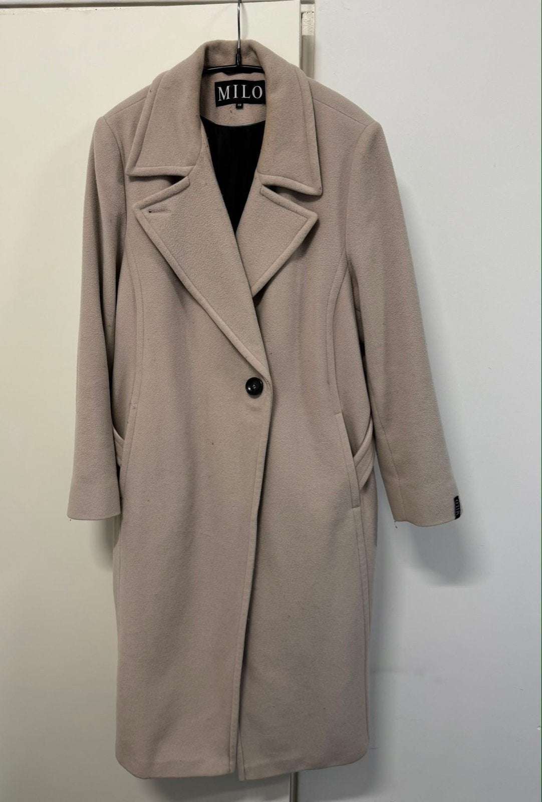 Milo beige lange jas - Maat xl, Ophalen of Verzenden, Gedragen, Maat 42/44 (L), Beige