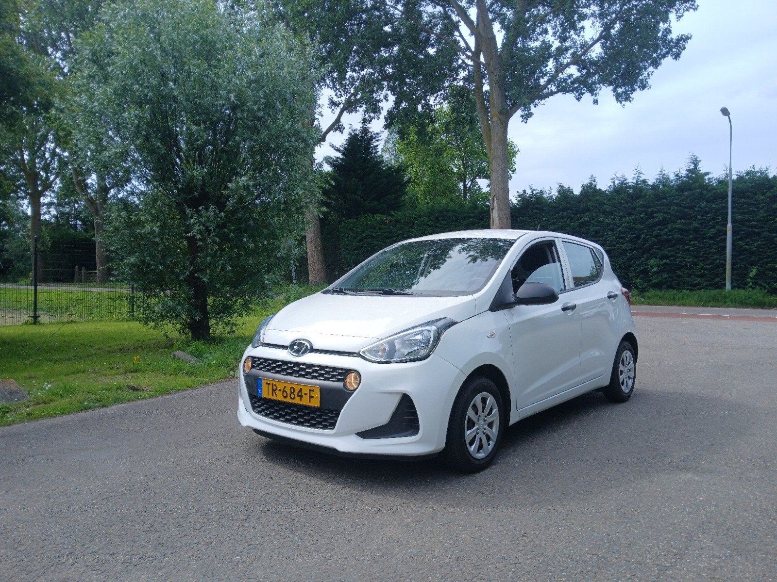 Hyundai i10 1.0i 66pk 2018 Wit, Voorwielaandrijving, Stof, 4 stoelen, Wit