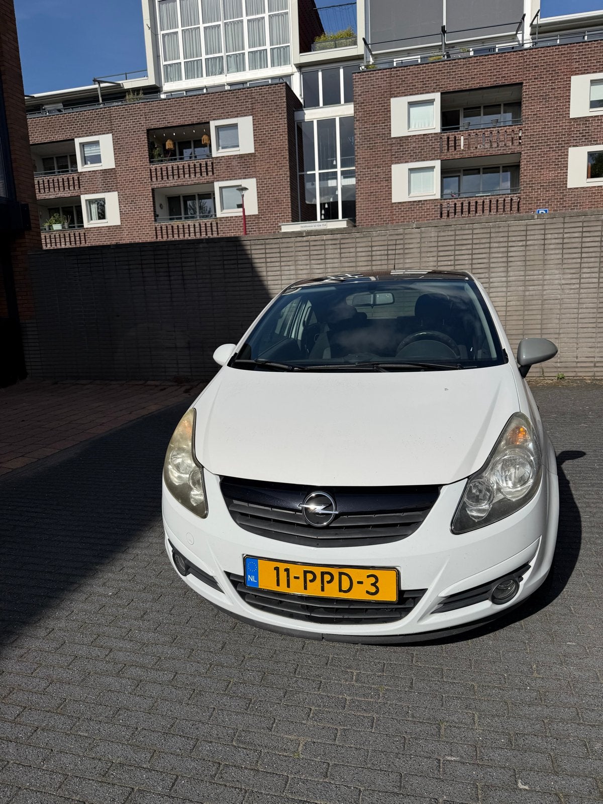 Opel Corsa 1.4 16V 3D 2011 Wit, Auto's, Voorwielaandrijving, 40 €/maand, 1398 cc, 4 cilinders