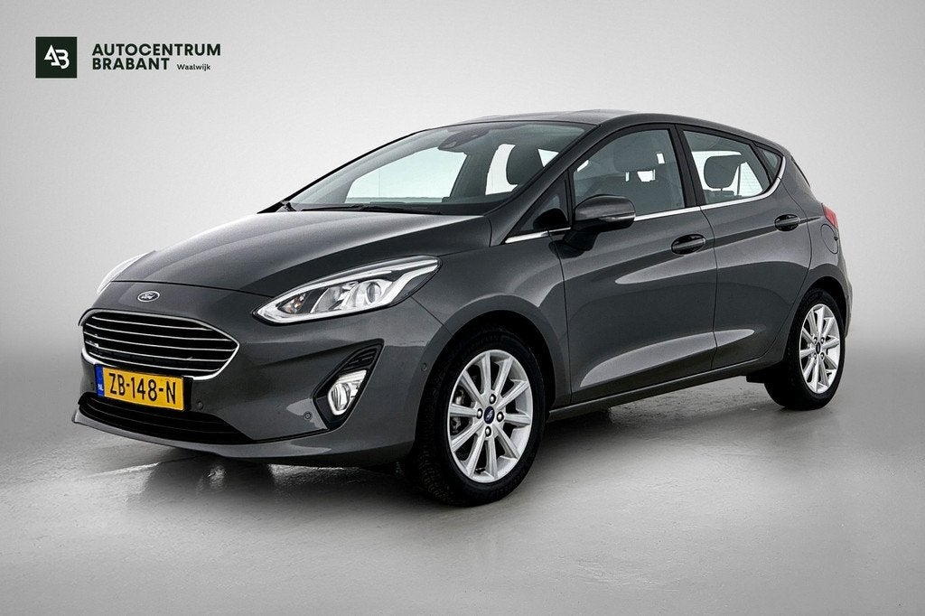 Ford Fiesta 1.0 EcoBoost Titanium (NAVIGATIE, CARPLAY, PARKE, Auto's, Ford, Stof, Gebruikt, 100 pk, 49 €/maand