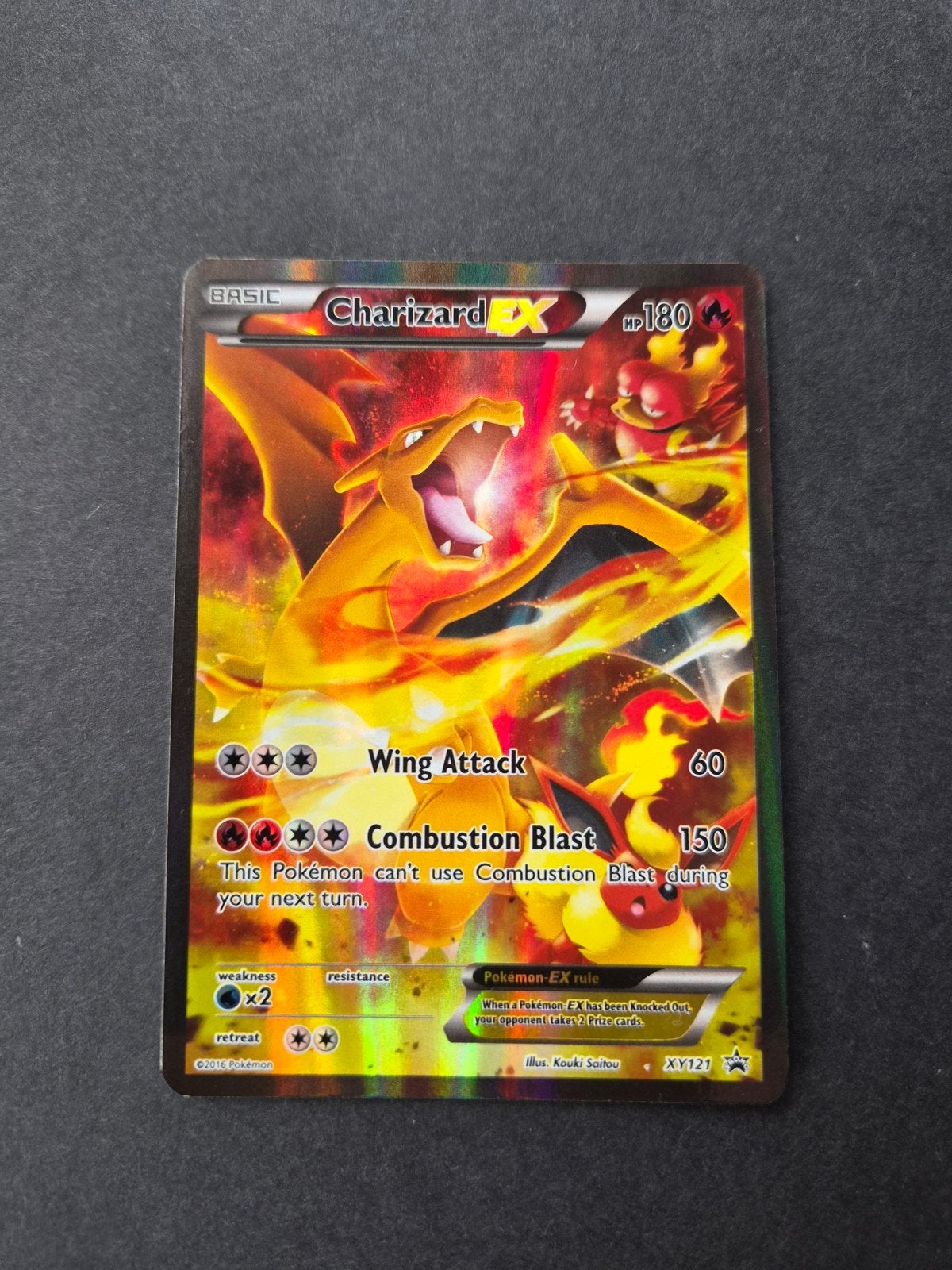 Charizard ex XY121 Pokemon Promo, Ophalen of Verzenden, Zo goed als nieuw, Booster, Foil