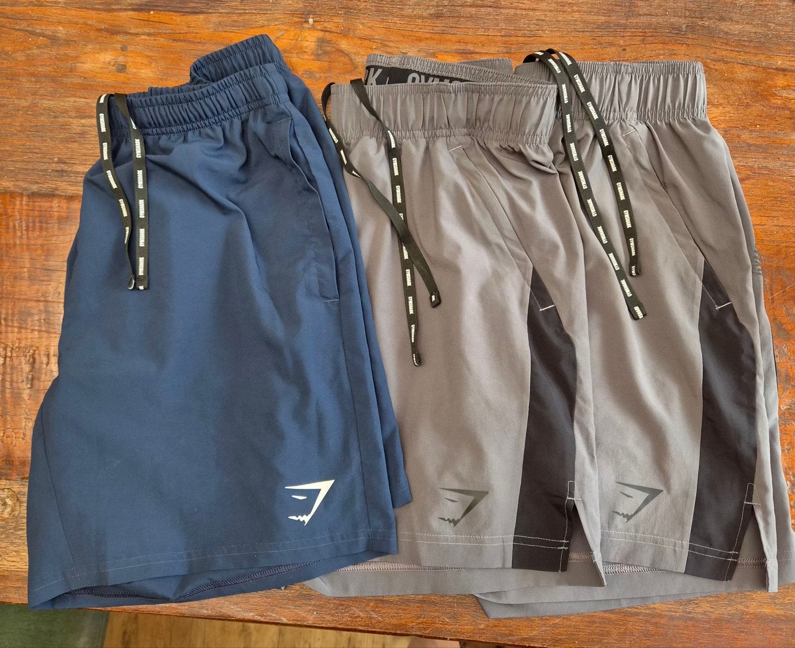 3x Gymshark sportshorts maat S - Grijs en Donkerblauw, Fitness, Verzenden, Gymshark, Zo goed als nieuw