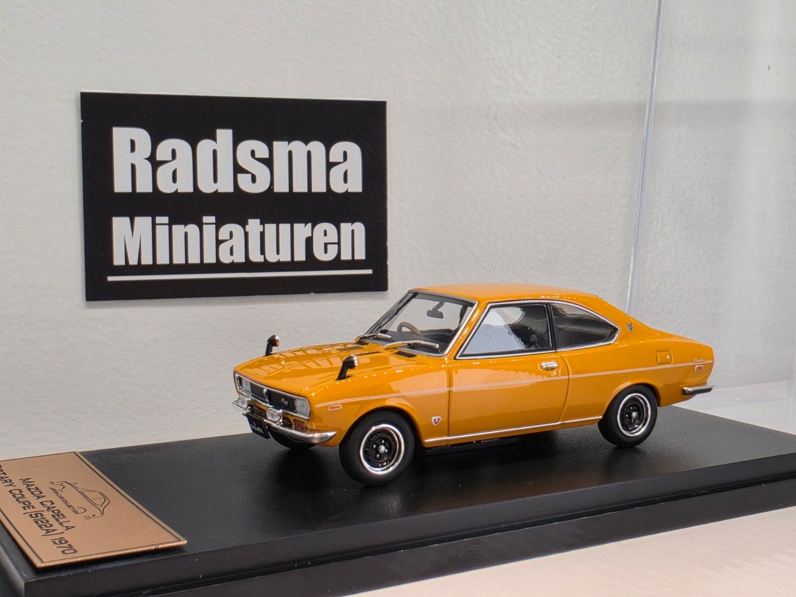Mazda Capella rotary coupe 1970 - Oranje - 1:43 Japan collec, Hobby en Vrije tijd, Overige merken, Auto, Ophalen of Verzenden