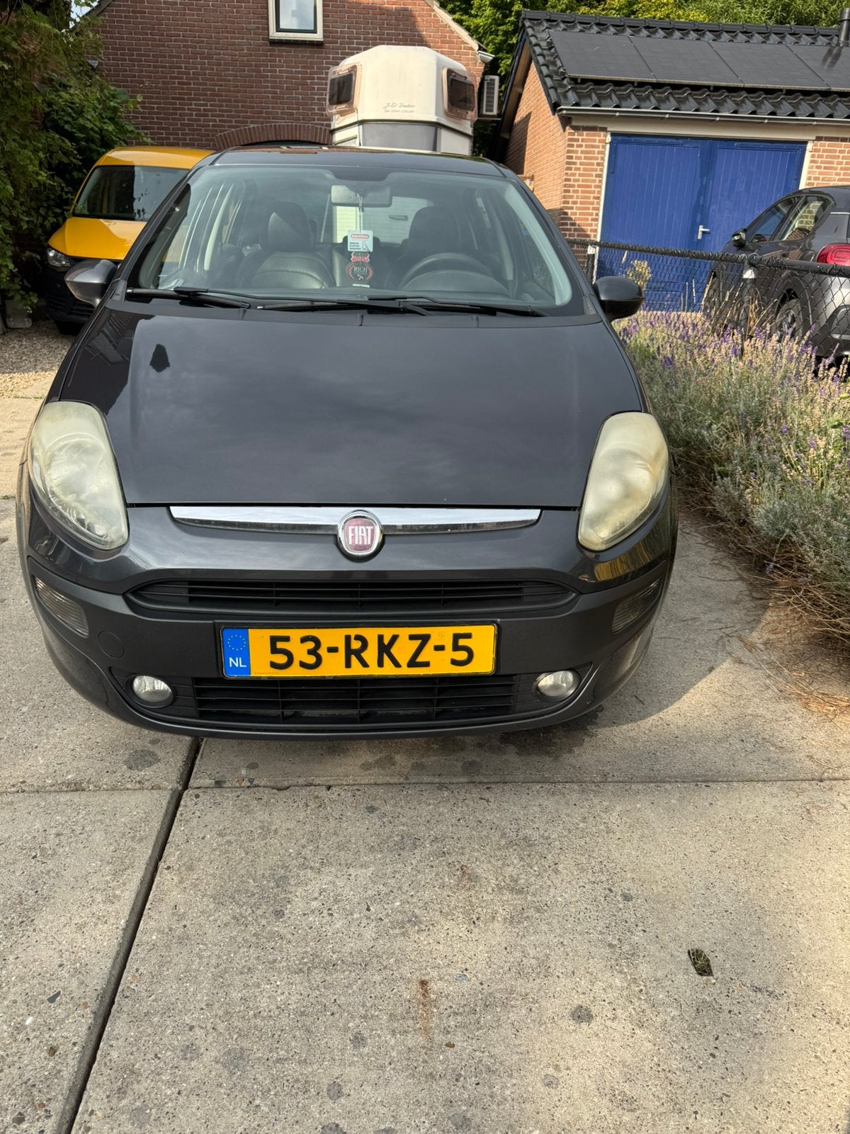 Fiat Punto 1.3 Multijet 62KW 5DR 2011 Grijs, Auto's, Fiat, Voorwielaandrijving, Euro 5, 28 km/l, Zwart