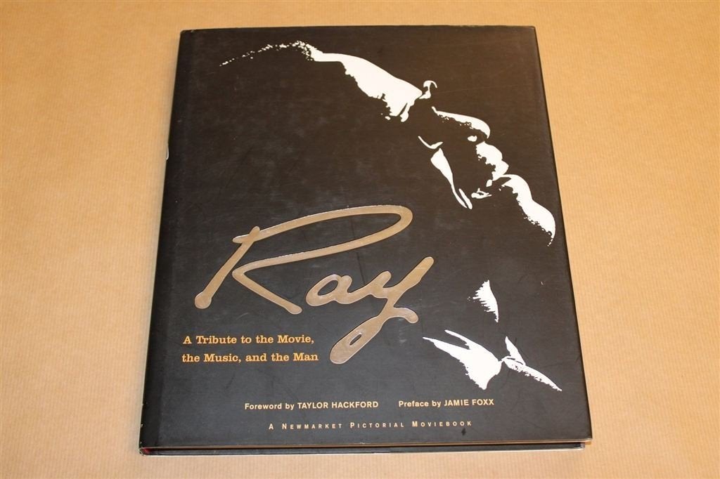 Ray — Boek bij Film over Muzieklegende Ray Charles, Ophalen of Verzenden, Zo goed als nieuw, Artiest