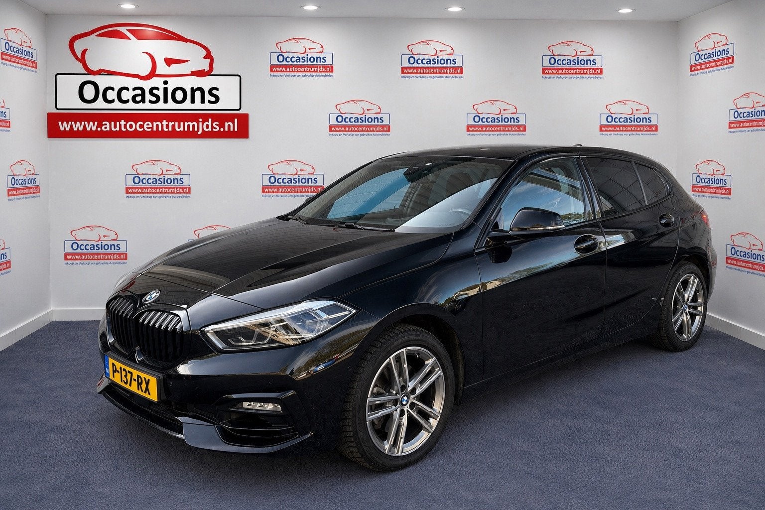 BMW 1-serie 116i High Executive, Auto's, Gebruikt, Zwart, Leder, Bedrijf