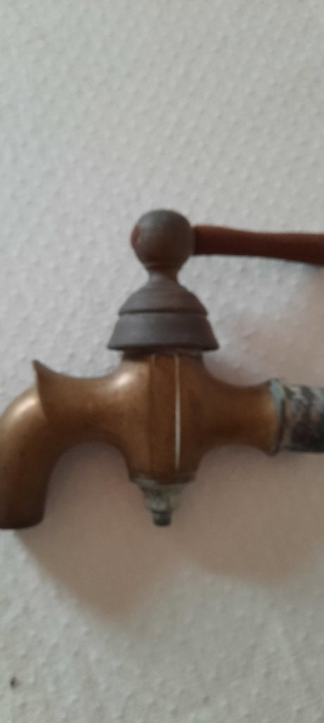 Oude messing kraan, Ophalen