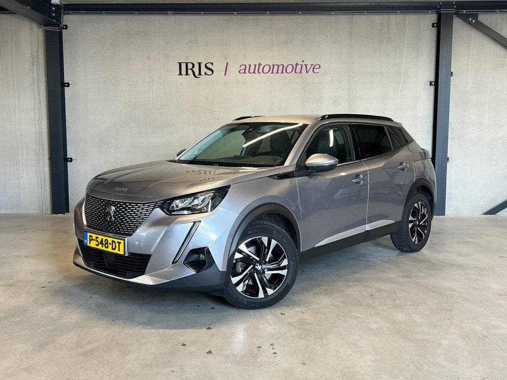 Peugeot E-2008 Allure 50kwH - SOH 91% - All Season - Apple C, Auto's, Peugeot, 330 km, Gebruikt, Zwart, 1523 kg