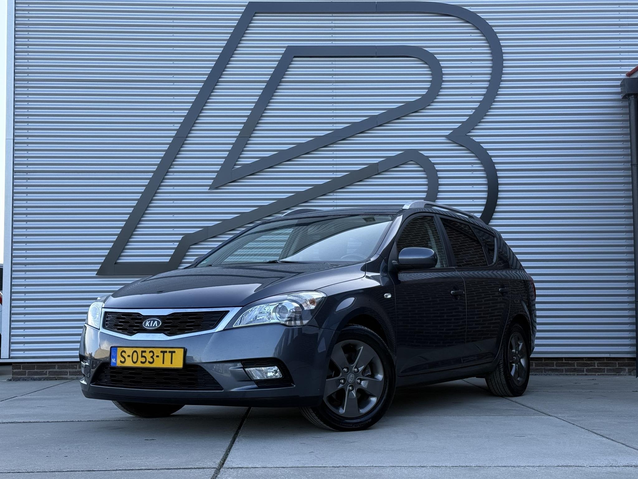 Kia cee'd 1.4 CVVT Seven 2e Eigenaar|Navi|Airco|LM Velgen|Bl, Auto's, Voorwielaandrijving, Euro 5, Stof, Gebruikt