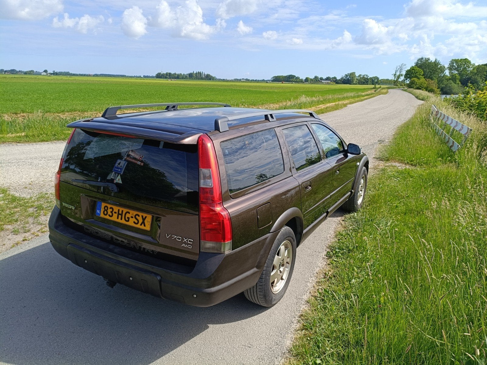 Volvo XC70 2.4 T XC 4WD 2001 Bruin, Auto's, Volvo, 1800 kg, Automatische klimaatregeling, Bruin, XC70