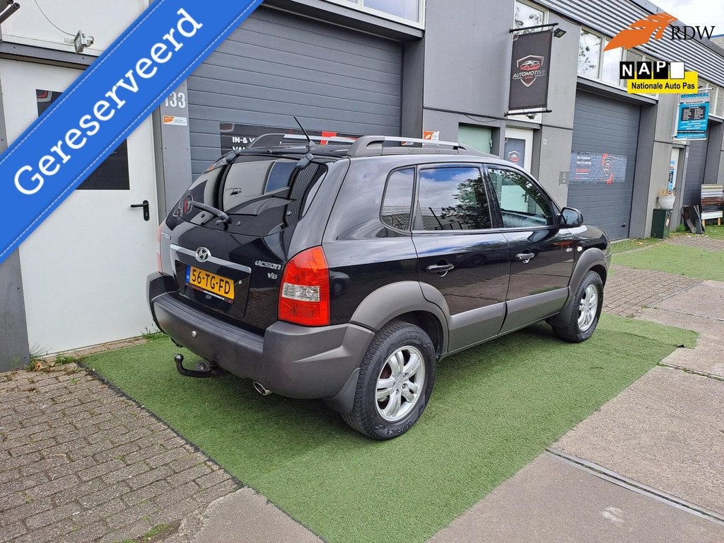 Hyundai Tucson 2.7i V6 4WD Style 2006 Automaat Airco NAP, Auto's, Hyundai, Automaat, Gebruikt, Zwart, 2656 cc