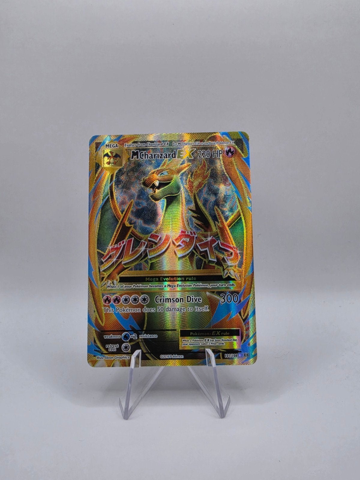 Pokémon M Charizard EX, Ophalen of Verzenden, Zo goed als nieuw, Losse kaart, Foil