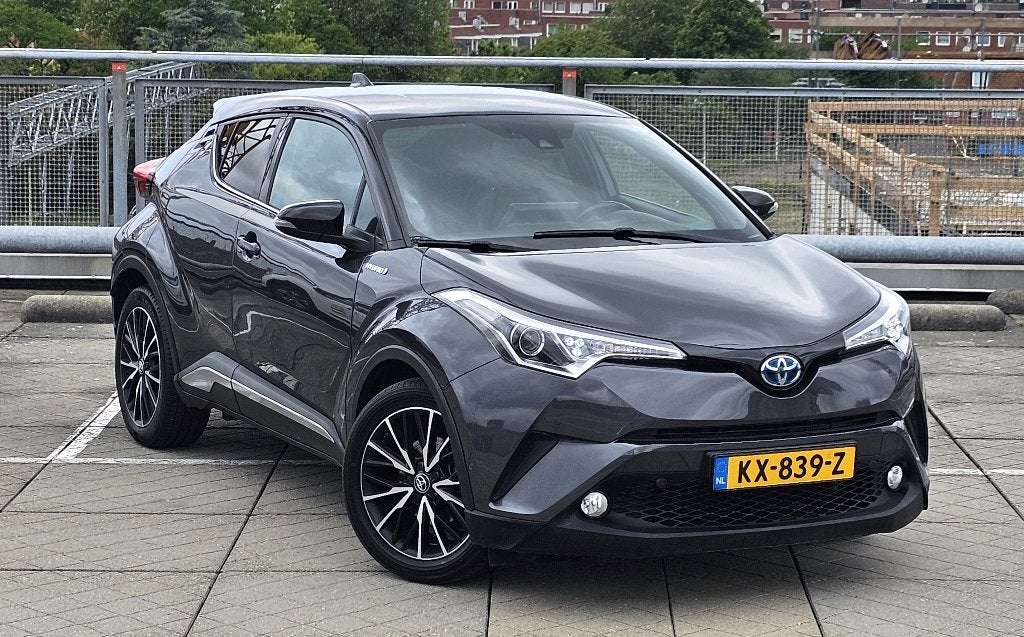 Toyota C-HR 1.8 Hybrid First Edition JBL 2016 Grijs BTW-auto, Auto's, Toyota, 725 kg, Euro 6, 4 cilinders, Leder en Stof