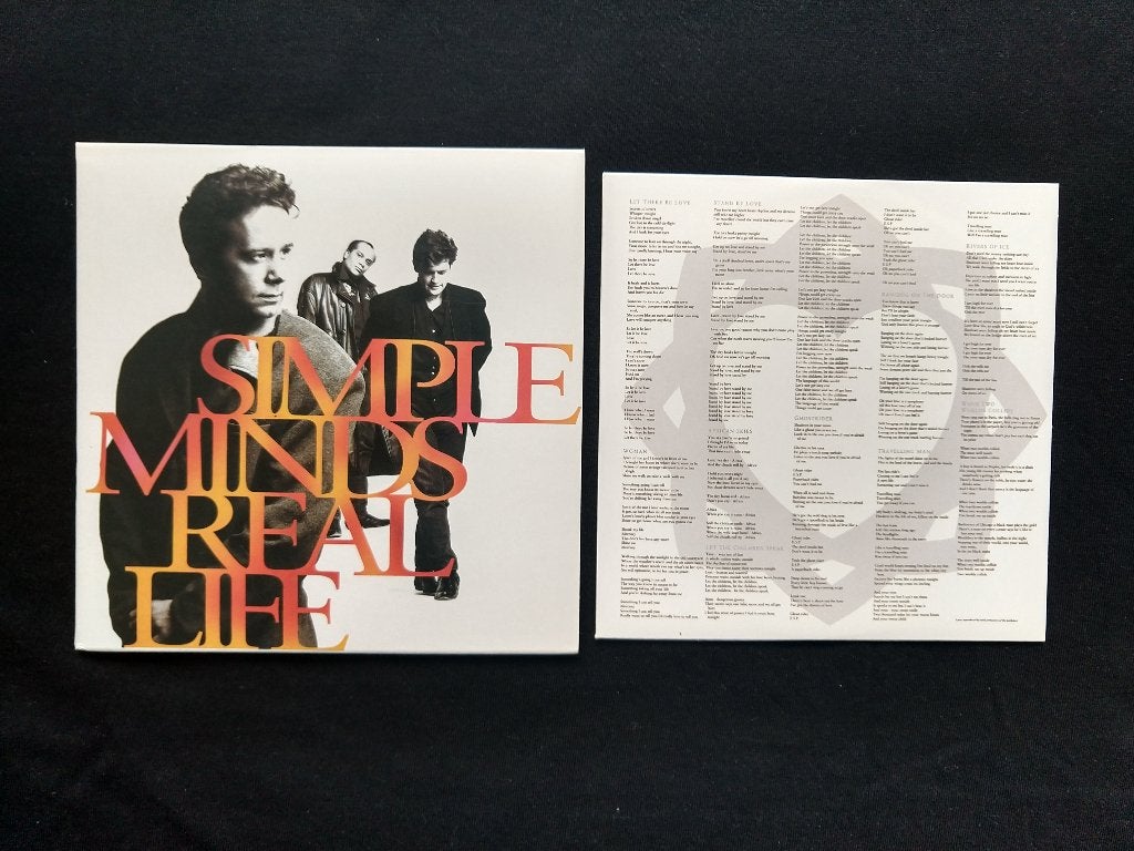Simple Minds - Real Life CD (LP Replica - Remaster 2002), Cd's en Dvd's, Rock, Ophalen of Verzenden, Zo goed als nieuw, Digipak