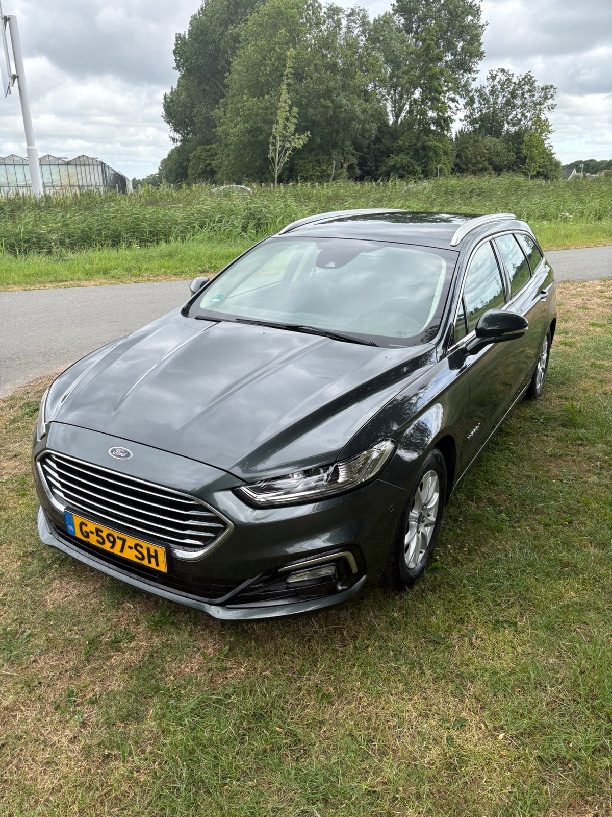 Ford Mondeo 2.0 HEV 187pk Ecvt 2020 NAP Groen, Stof, 4 cilinders, Mondeo, 1616 kg