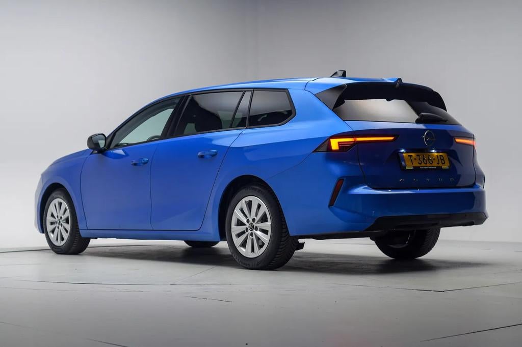 Opel Astra 1.2 Business Edition Aut. [ Navi Camera Stoel/stu, Automaat, Automatische klimaatregeling, 1199 cc, Blauw
