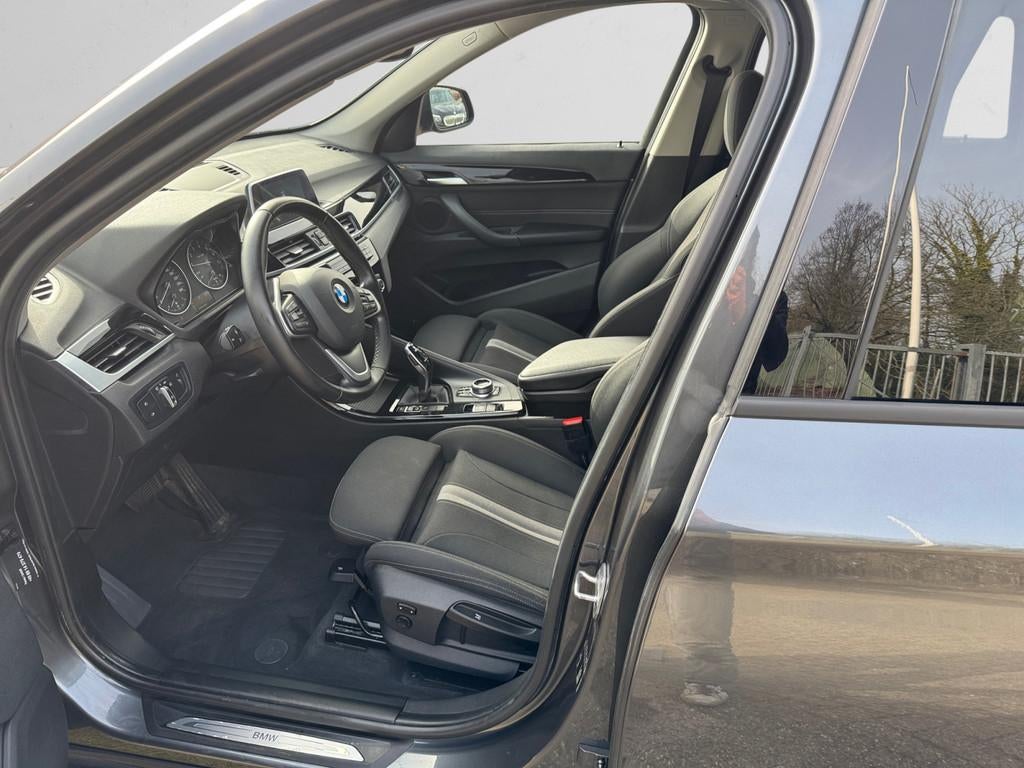 BMW X1 sDrive18i High Executive Aut- Sport Interieur, Stoelv, Stof, Gebruikt, Met garantie (alle), Origineel Nederlands
