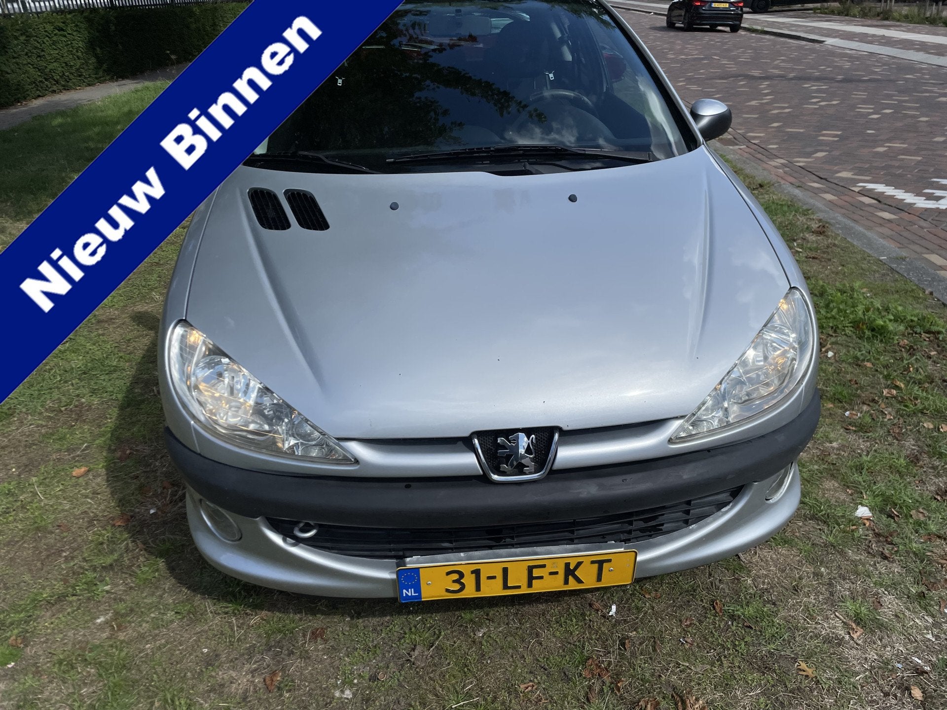 Peugeot 206 1.4 XS Frisse 206 weinig km nap nl auto leuke st, Voorwielaandrijving, Stof, Zwart, 4 cilinders