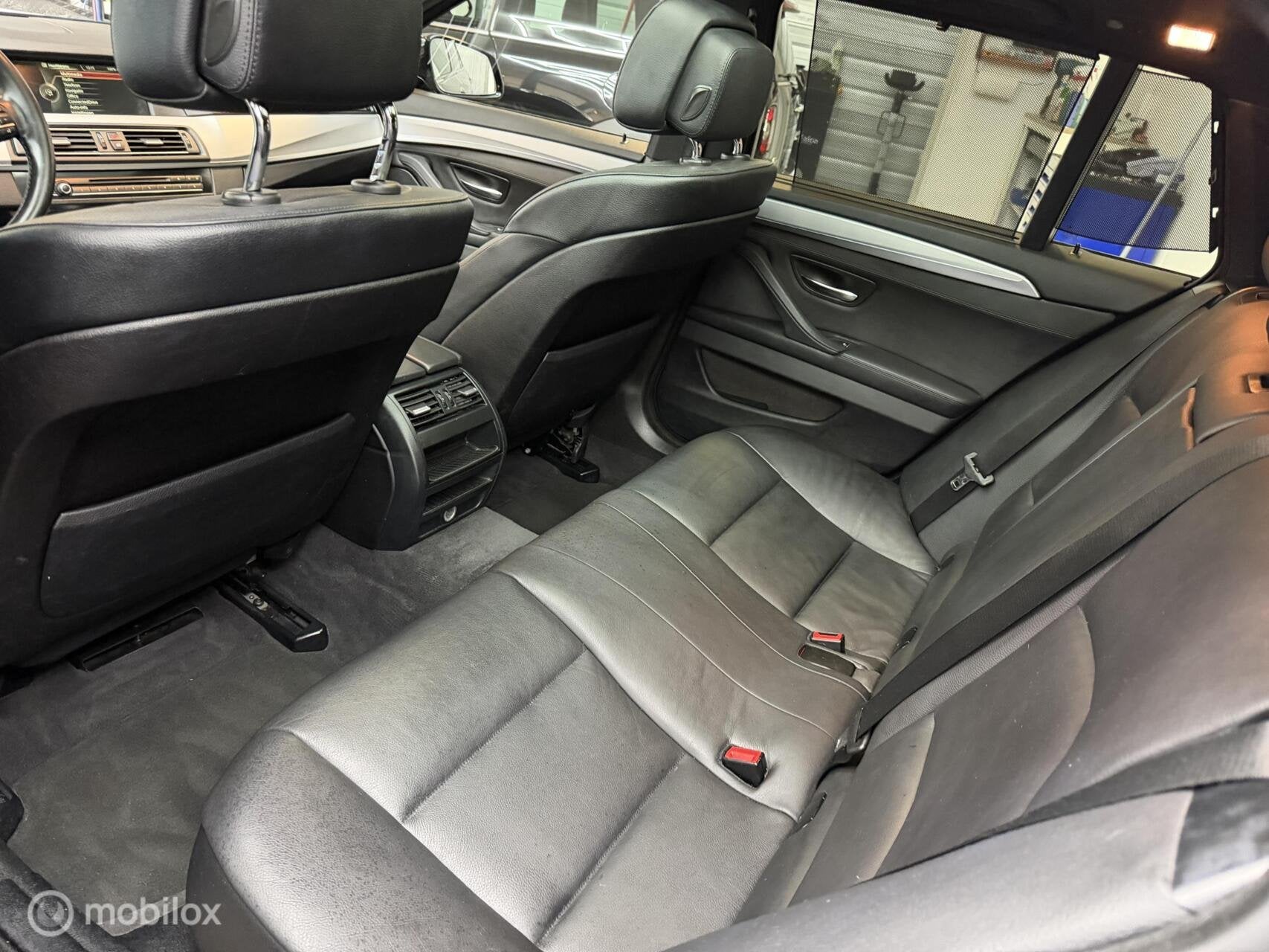 Foto 13 van BMW 5-serie Touring 520i High Executive