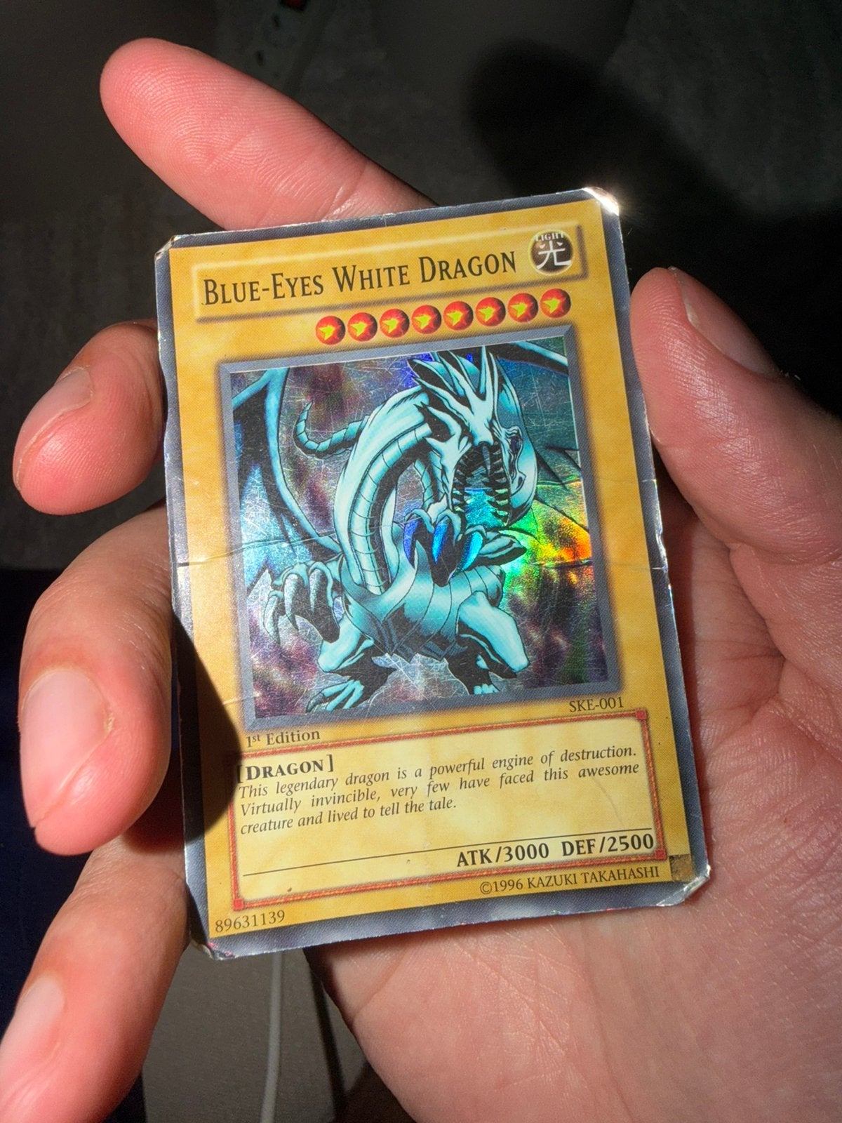 Blue Eyes White Dragon 1st edition SKE-001, Ophalen, Gebruikt, Losse kaart, Foil
