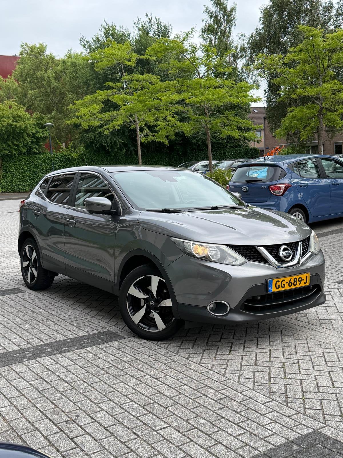 Nissan Qashqai 1.5 DCI 81KW 2WD 2015 Grijs, Voorwielaandrijving, Stof, Zwart, Origineel Nederlands