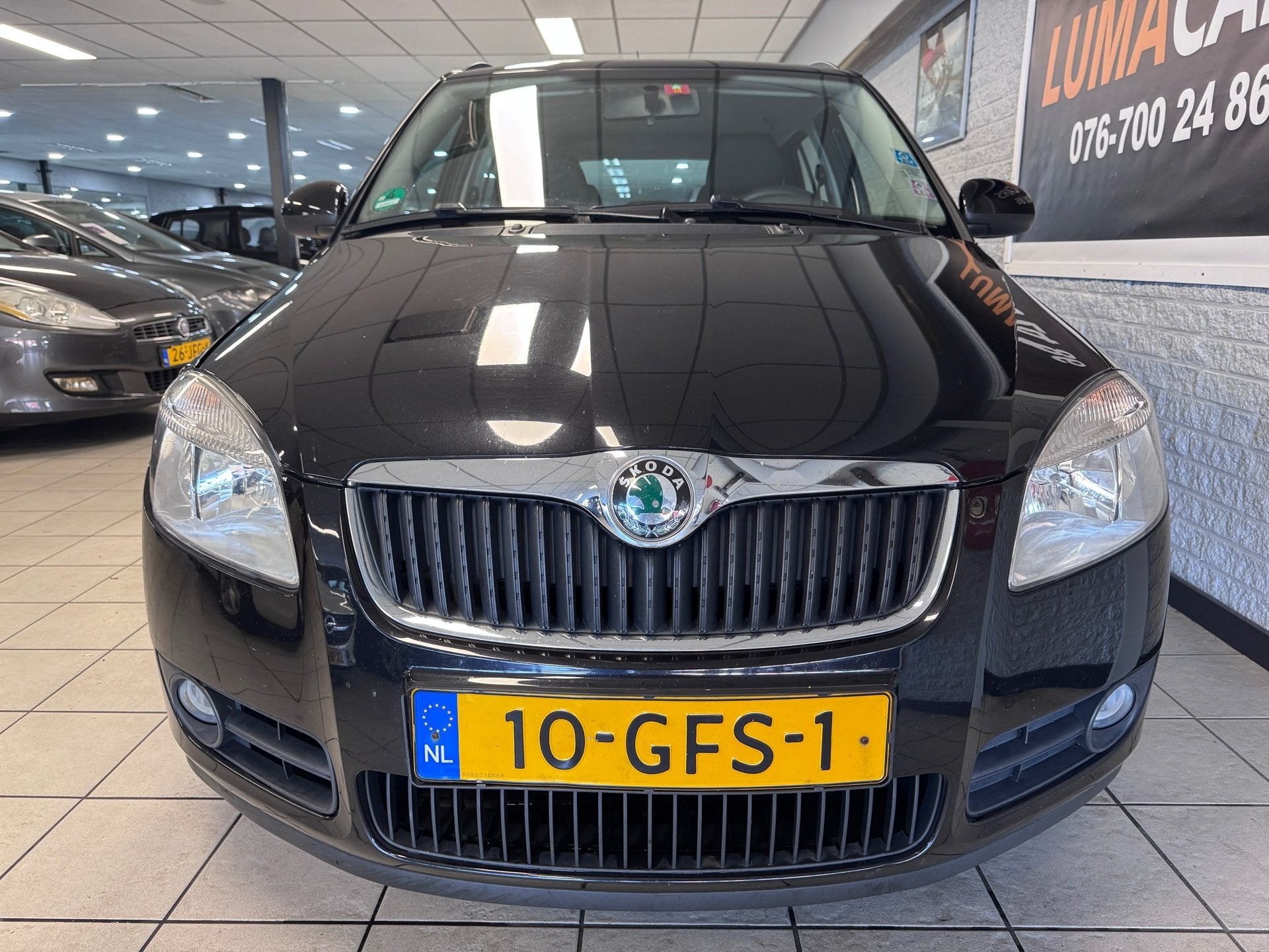 Skoda Fabia Combi 1.4-16V Ambiente | Nieuwe APK | Cruise |, Voorwielaandrijving, 4 cilinders, Verwarmde buitenspiegels, Zwart