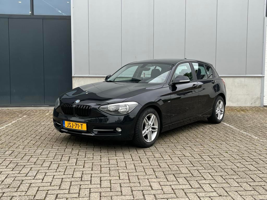 BMW 1-Serie 116I 100KW 5DR 2012 Zwart, Auto's, BMW, 1-Serie, 4 cilinders, Zwart, 1200 kg