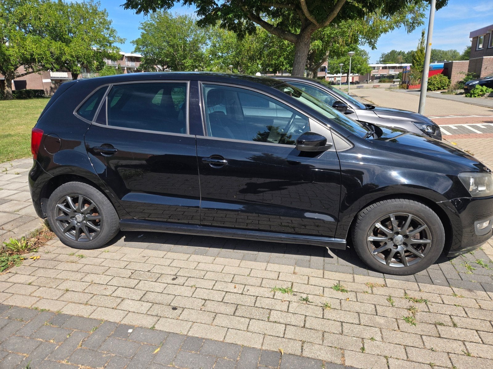 Volkswagen Polo 1.2 TDI 55KW BM 2013 Zwart, Auto's, Voorwielaandrijving, 74 pk, 1199 cc, 96 €/maand