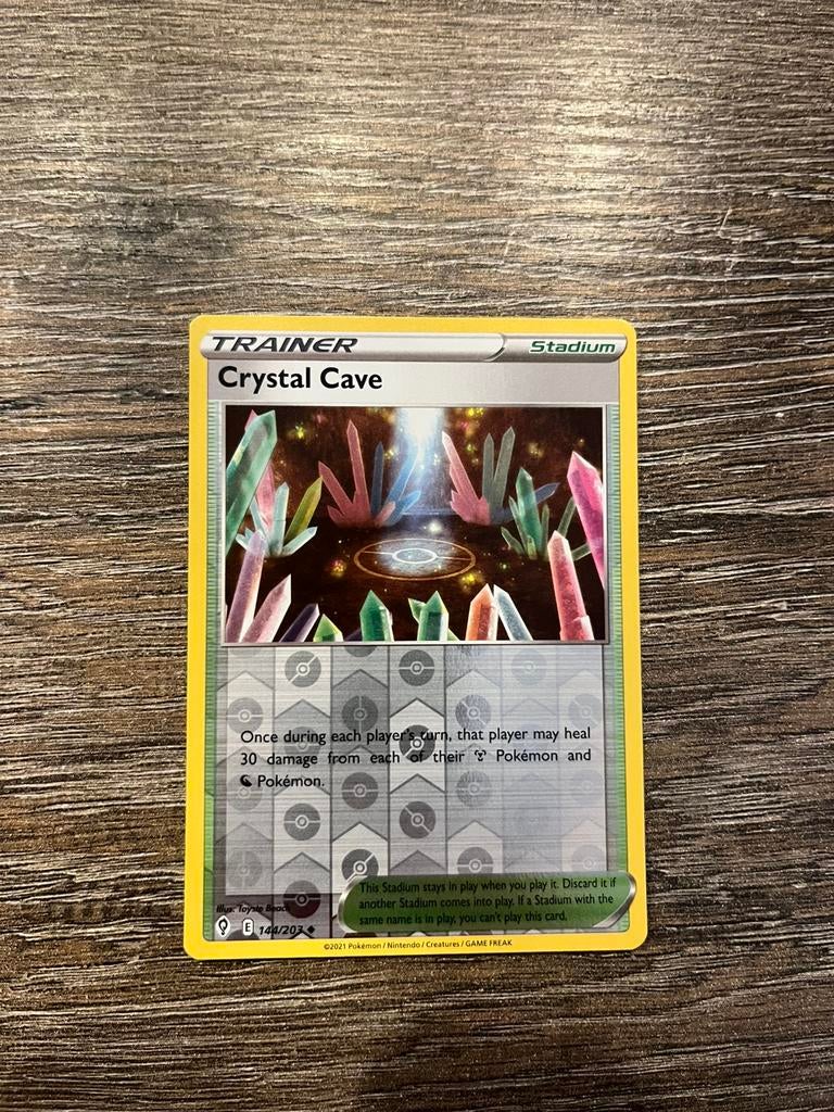 Crystal Cave EVS 144/203 reverse holo, Ophalen of Verzenden, Zo goed als nieuw