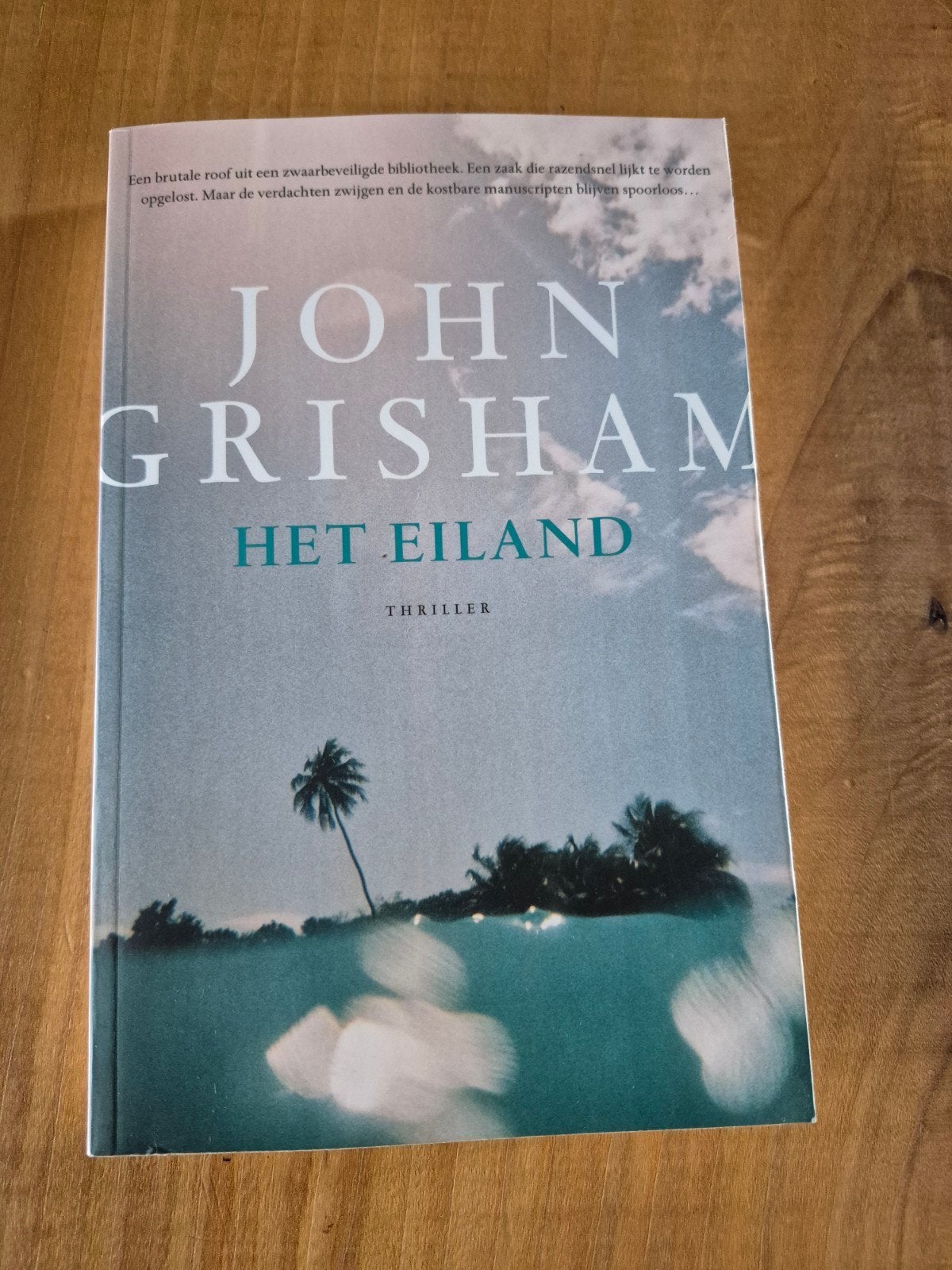 Het eiland,  john grisham thriller, Ophalen of Verzenden, Zo goed als nieuw