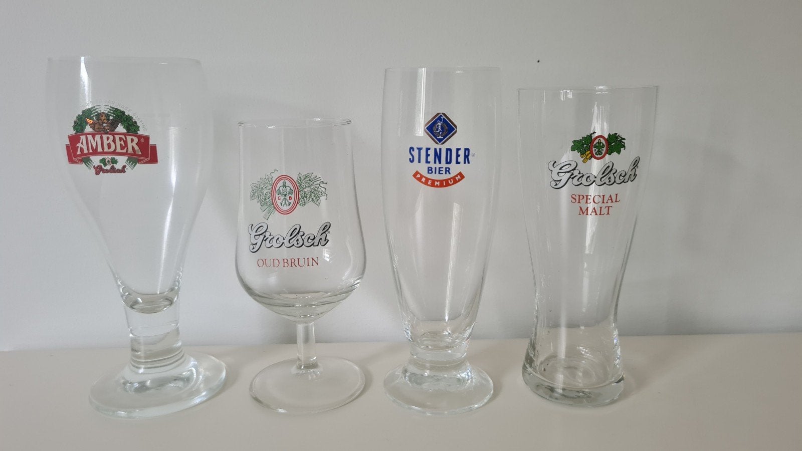 Bierglazen - Grolsch, Amber, Stender - 4 stuks, Verzamelen, Ophalen of Verzenden, Gebruikt