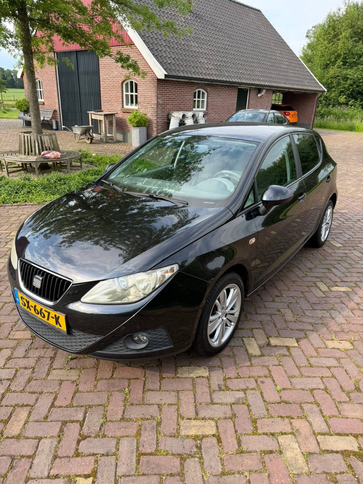 Seat Ibiza 1.4 63KW 5DRS 2010 Zwart, Auto's, Voorwielaandrijving, 86 pk, 40 €/maand, 4 cilinders