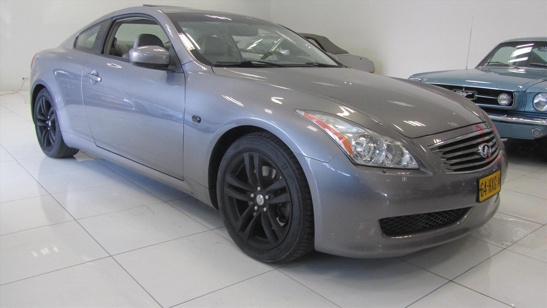 Infiniti G Coupé AUTOMAAt V6 leer achteruit Camera zeer lux, Auto's, 450 kg, Gebruikt, 750 kg, Leder