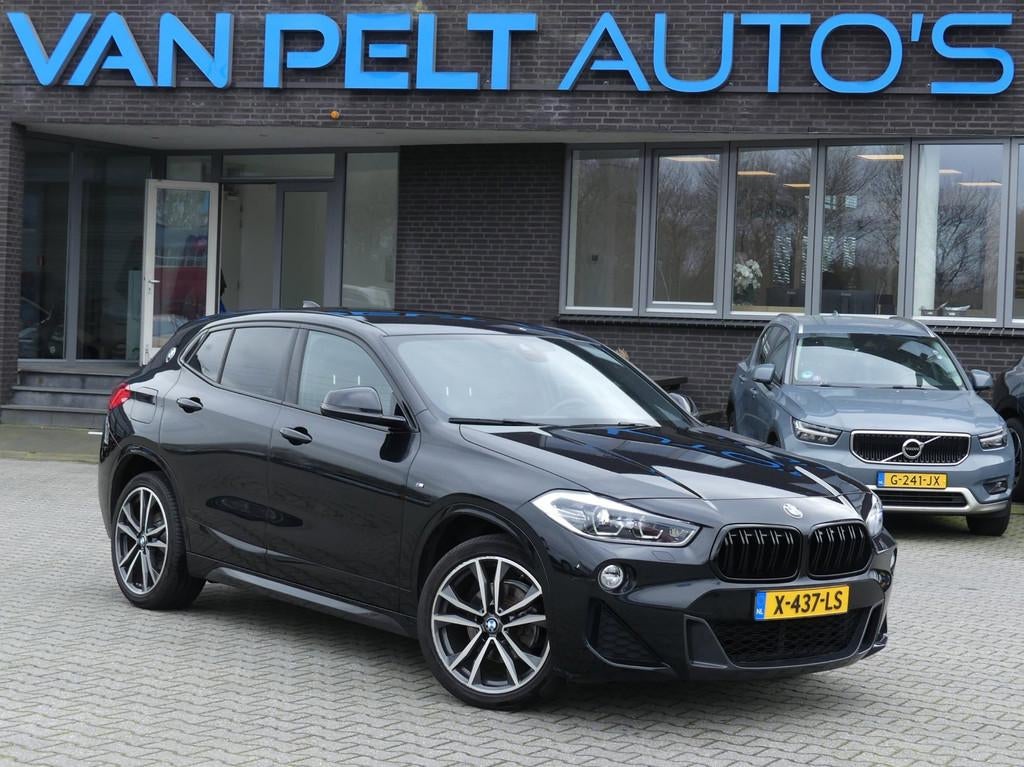 BMW X2 SDrive18i High Executive Edition, Auto's, BMW, Gebruikt, Leder en Stof, Zwart, 3 cilinders