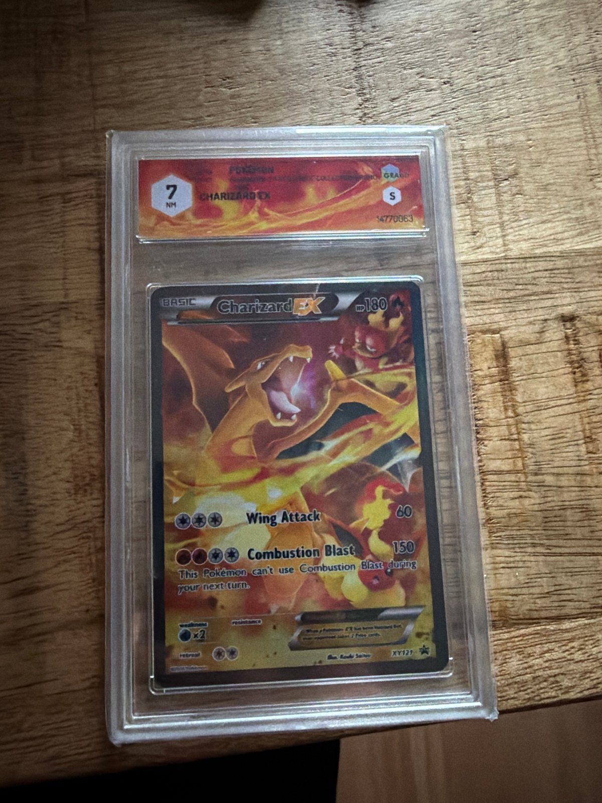 Charizard EX Pokémon kaart - GRAAD 7, Ophalen of Verzenden, Zo goed als nieuw, Losse kaart