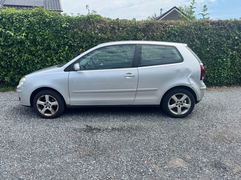 Volkswagen Polo 1.4-16V Comfortline | Airco | Cruise Control, Auto's, Voorwielaandrijving, Gebruikt, Zwart, Origineel Nederlands