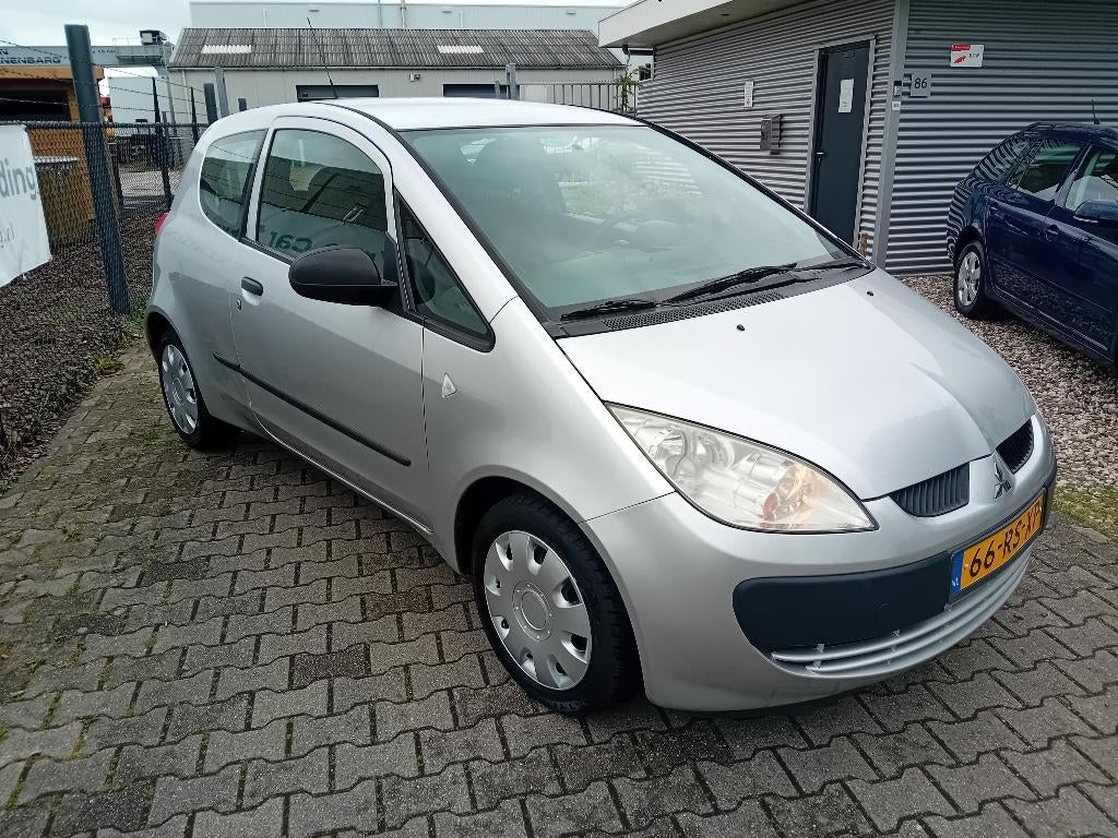 Mitsubishi Colt 1.3 Mivec CZ3 2005 Grijs AIRCO!! STUURBEKR!!, Voorwielaandrijving, 4 stoelen, Colt, Origineel Nederlands