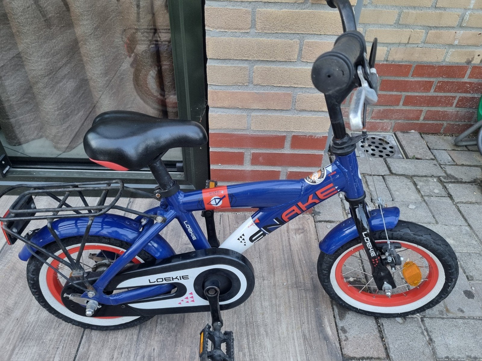 Gebruikte Loekie Snake 12 inch kinderfiets, Fietsen en Brommers, Ophalen, Gebruikt, Minder dan 16 inch, Loekie