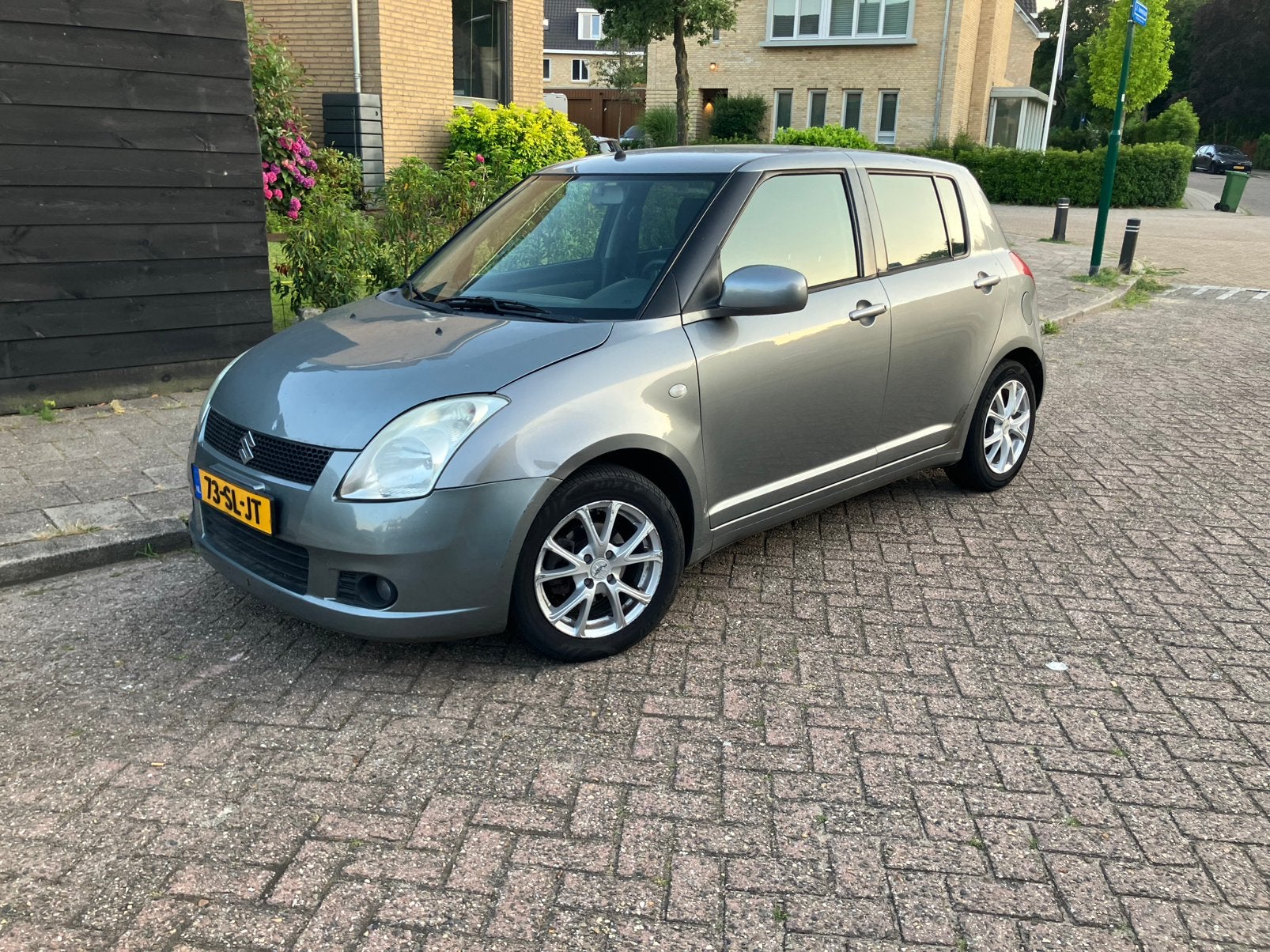 Suzuki Swift 1.3 5D 2006 Grijs, Auto's, Voorwielaandrijving, Euro 5, Stof, 40 €/maand