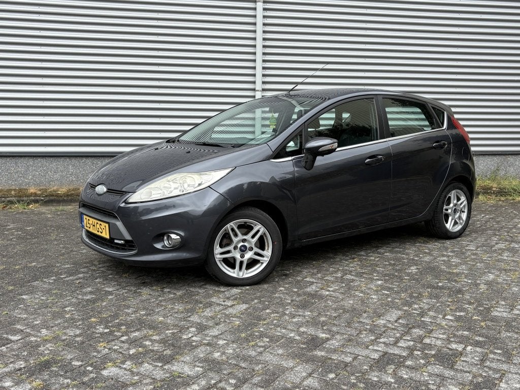 Ford Fiesta 1.25 Titanium Airco 5 Deurs Velgen Parrot APK, Auto's, Ford, 82 pk, Leder en Stof, Origineel Nederlands, Bedrijf