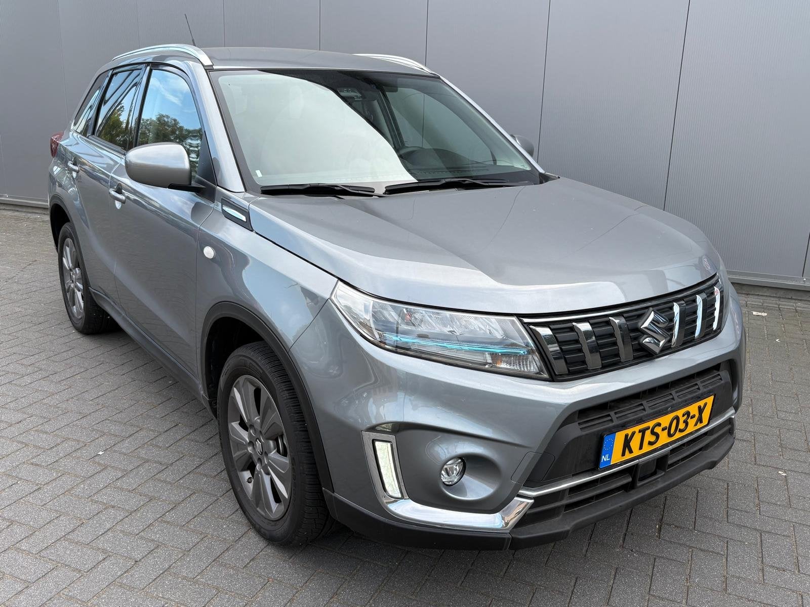Suzuki Vitara 1.5 Full-Hybrid 116PK Automaat Select Navigati, Auto's, Dealer onderhouden, Stof, Gebruikt, Euro 6