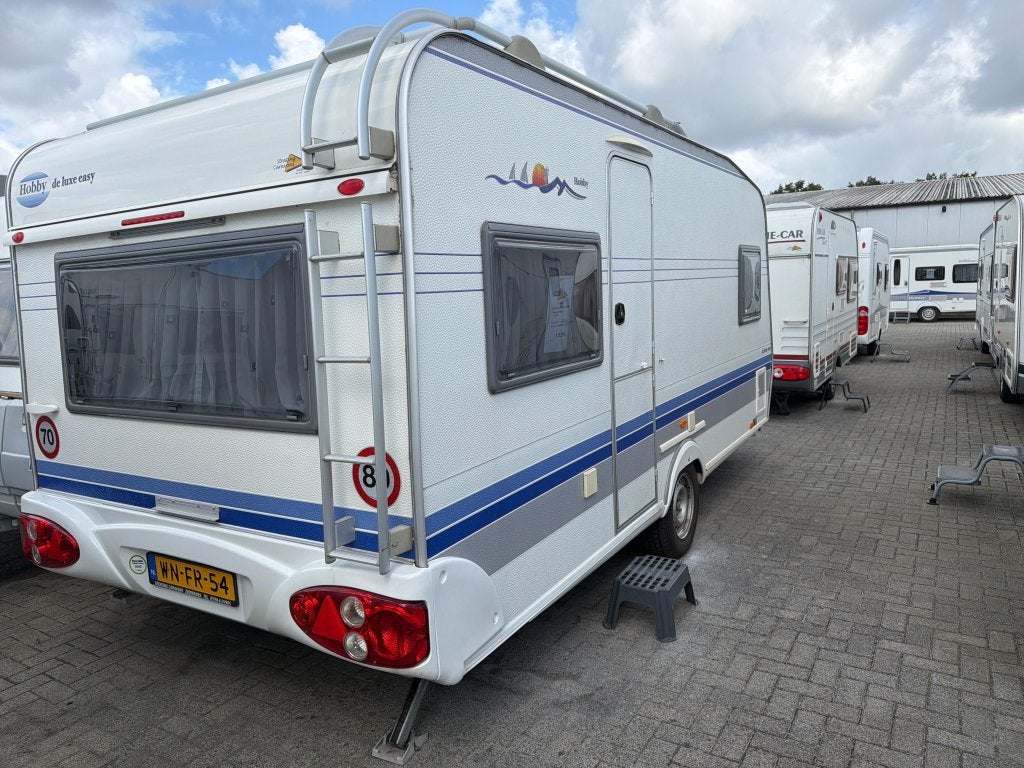 Hobby De Luxe 460 UFE, Caravans en Kamperen, Caravans, Ringverwarming, Rondzit, Hobby, Bedrijf