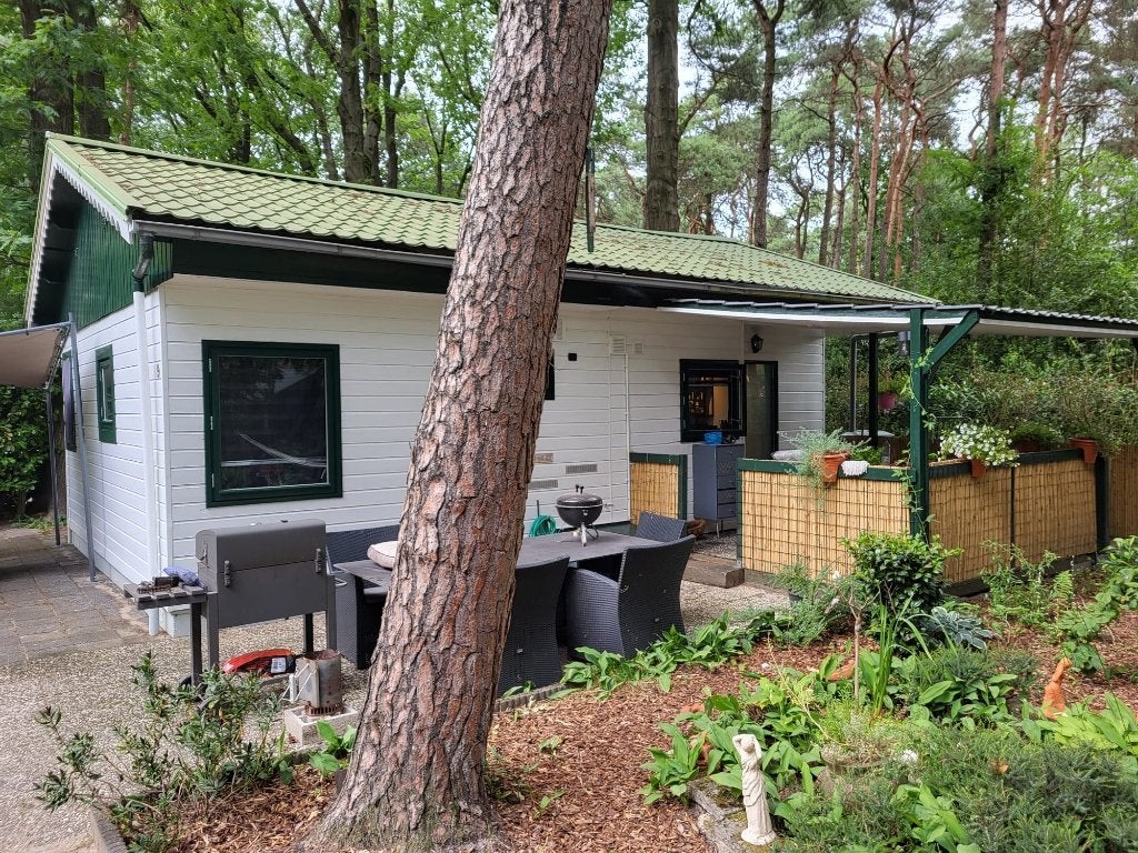 Te Koop: Boshuis op park De Paddock in Baarle Nassau., In bos, Noord-Brabant, 2 slaapkamers, Open haard