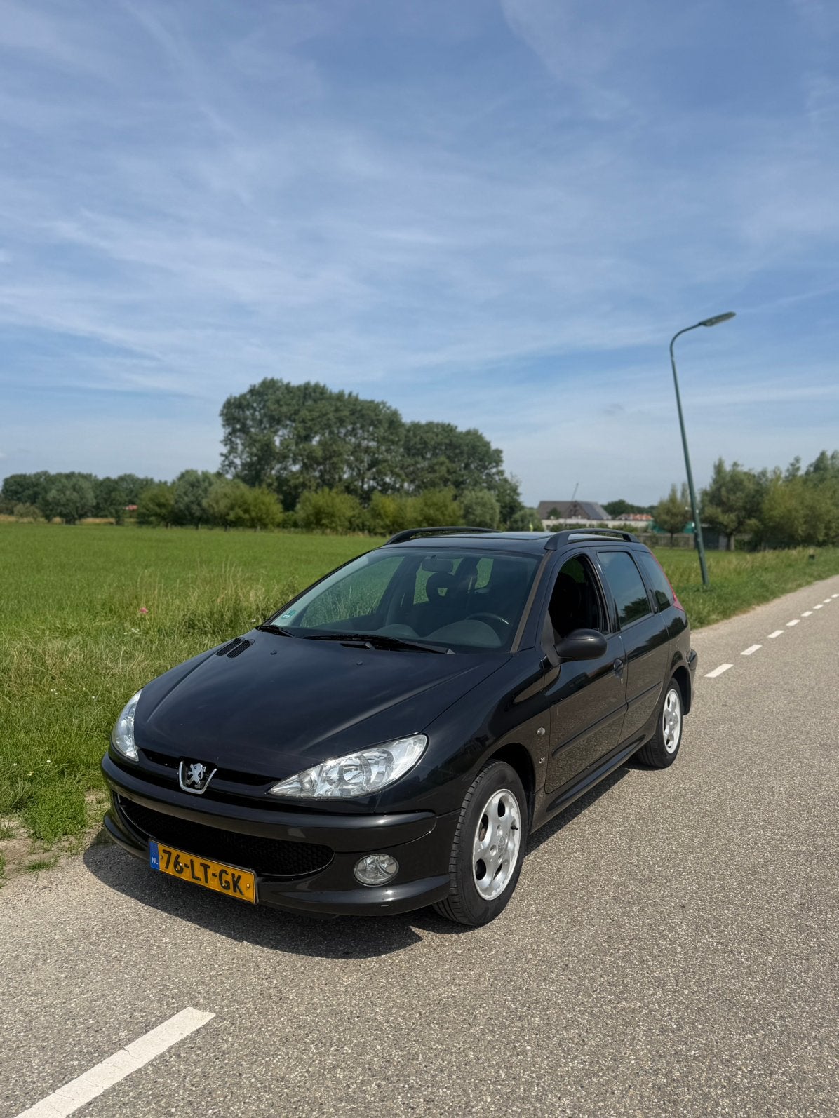 Peugeot 206 1.4 SW XS GOED ONDERHOUDEN, Auto's, Peugeot, Voorwielaandrijving, 4 cilinders, Zwart, Origineel Nederlands