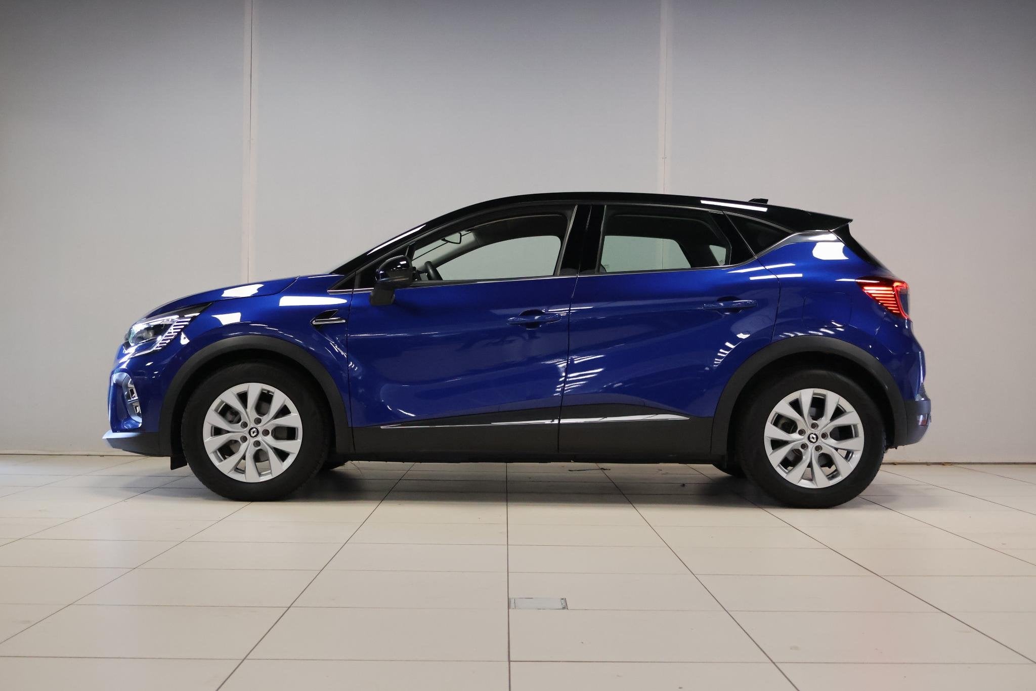 Renault Captur 1.6 E-Tech Plug-in Hybrid 160 Intens, Auto's, Renault, 4 cilinders, Blauw, Leder en Stof, Plug-in hybride