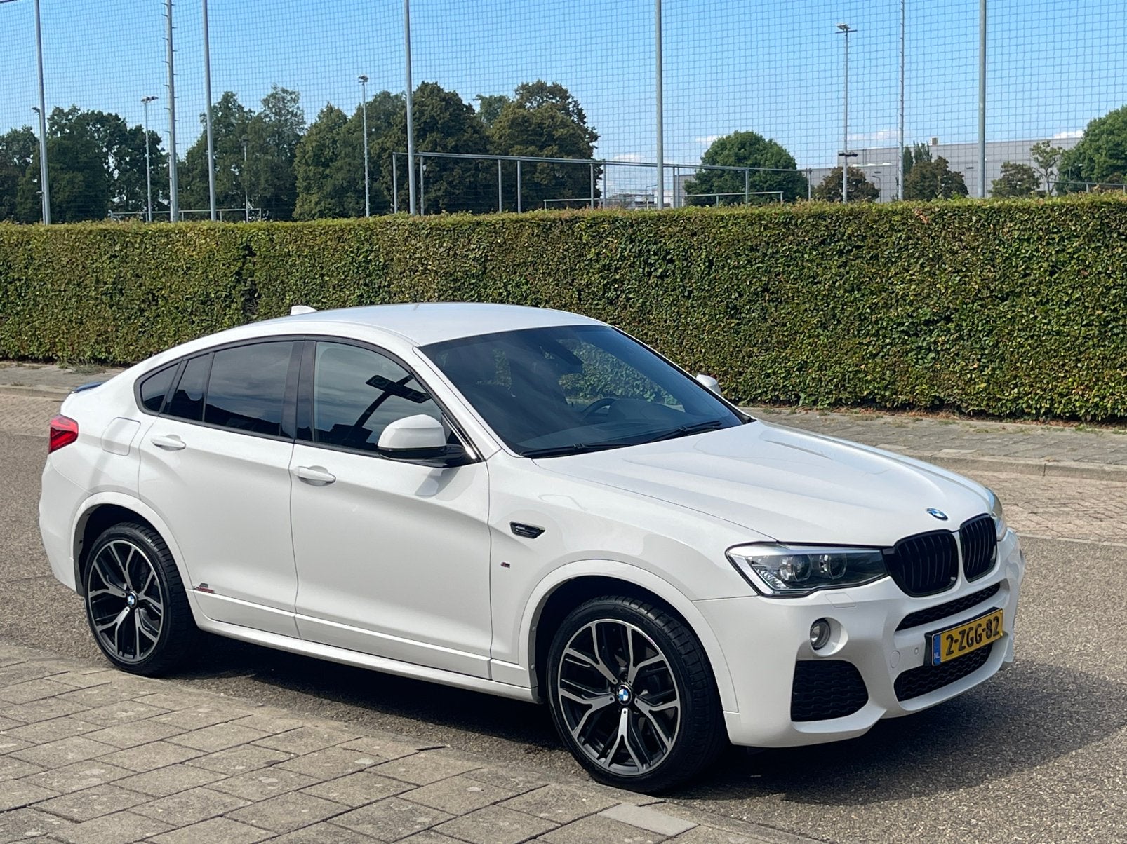 BMW X4 XDRIVE20I AUT M-SPORT HIGH EXEC. AC SCHNITZER, Auto's, Automaat, Zwart, 4 cilinders, Wit