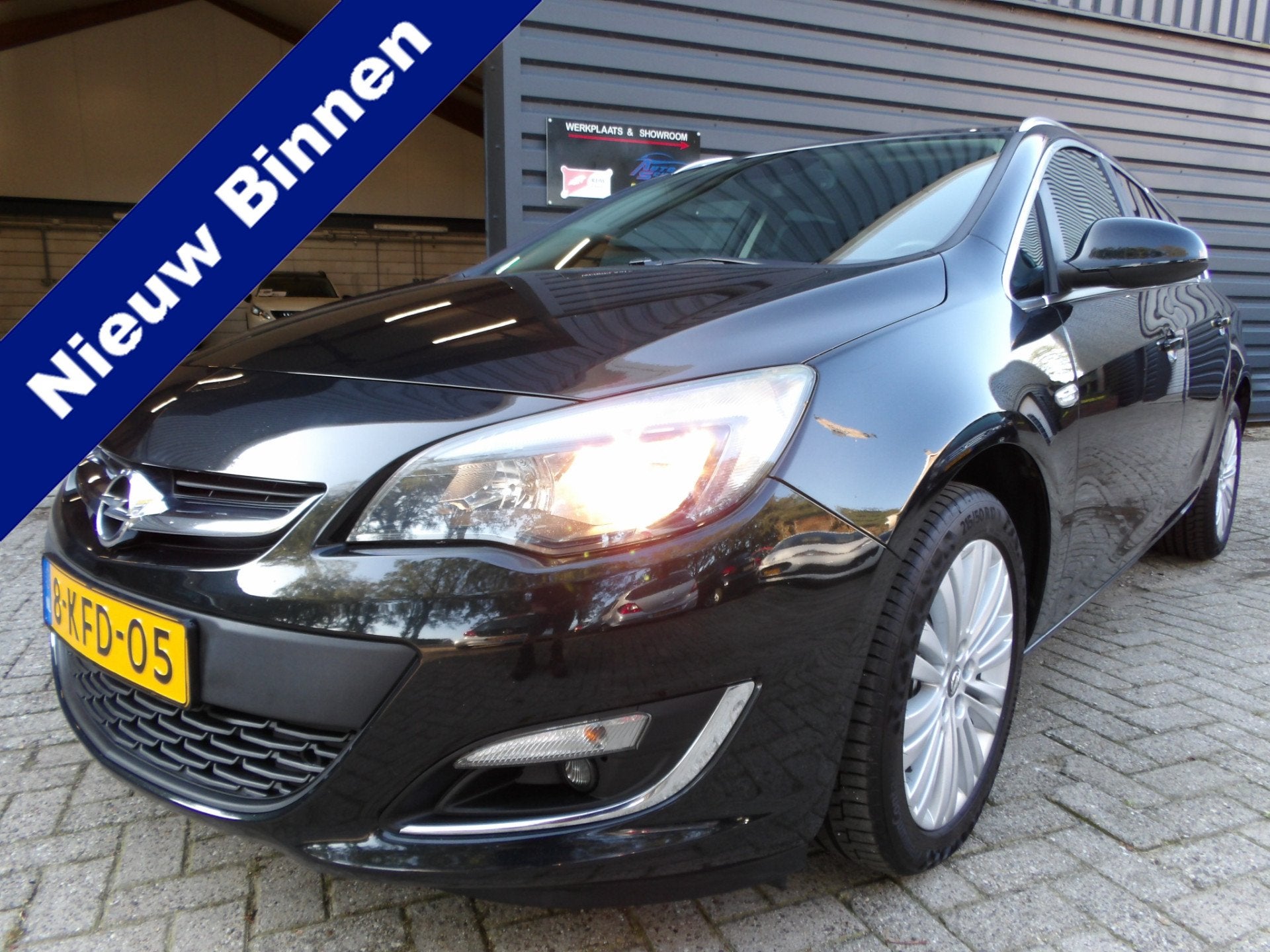 Opel Astra Sports Tourer 1.4 Turbo Design Edition Trekhaak C, Auto's, Voorwielaandrijving, Euro 5, Stof, Gebruikt
